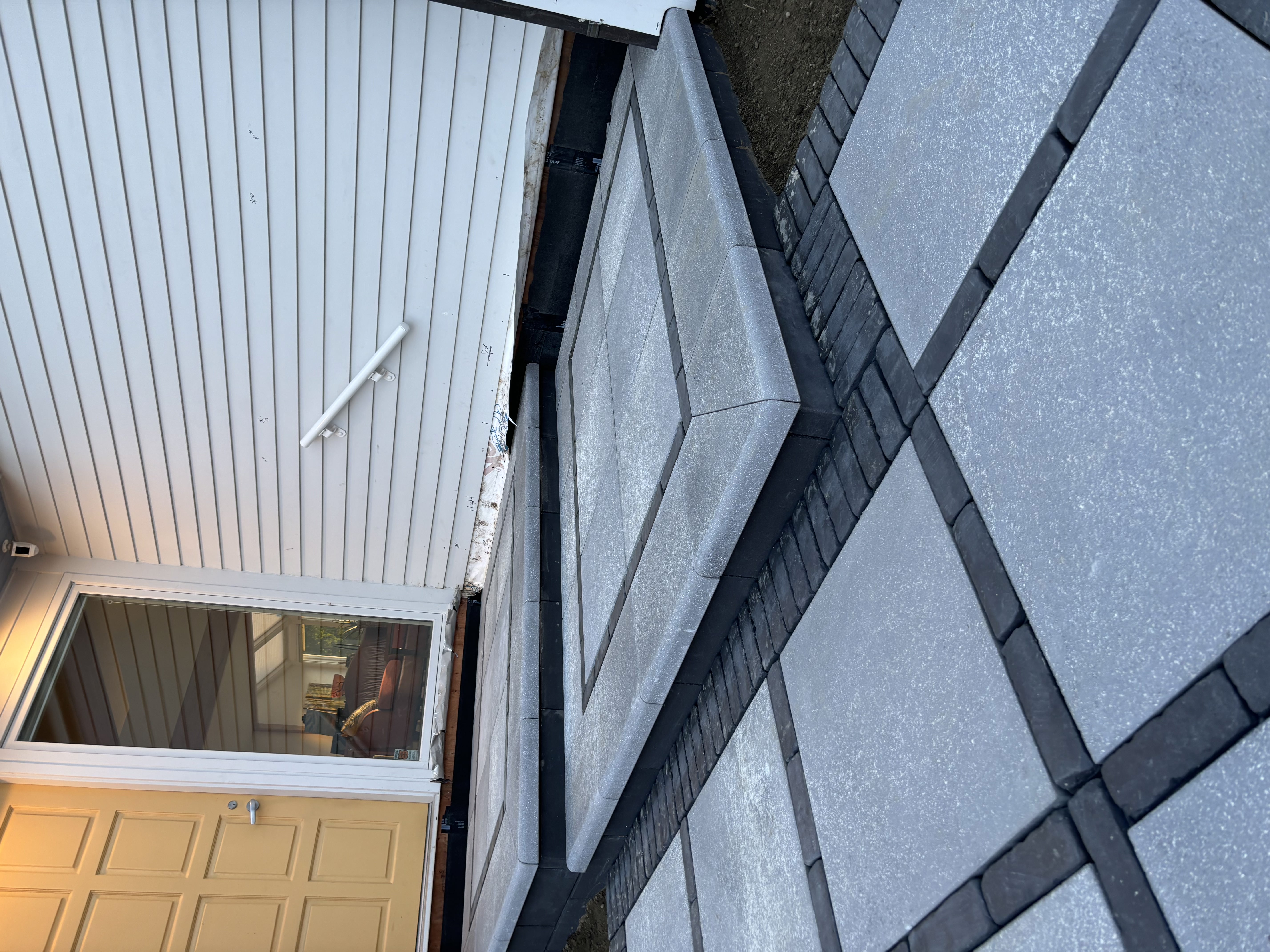 Multi-level patio design with stone steps in Middletown